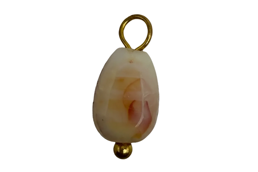 Faceted marbled teardrop gem in milky ivory with blush and amber tones, finished in gold
