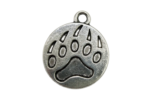 Silver round disc charm with engraved paw print and darkened recessed details