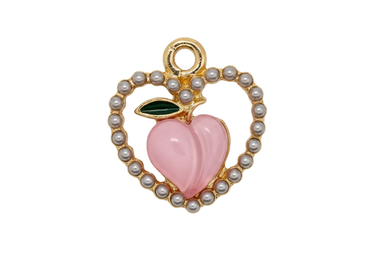 Gold apple charm with pearl border, pink heart center, and black leaf detail