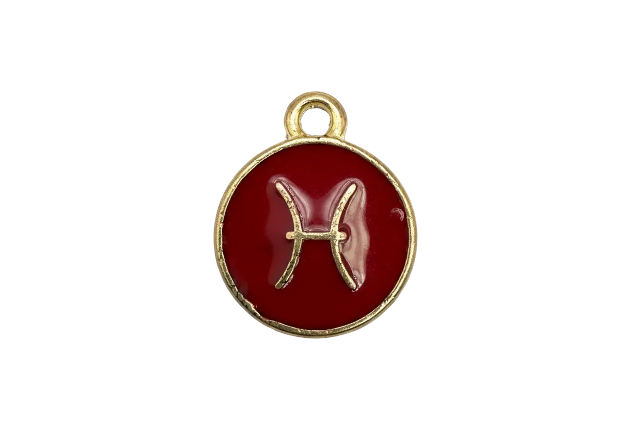 Gold-framed red enamel Pisces zodiac medallion with raised symbol