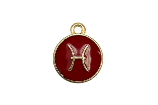 Gold-framed red enamel Pisces zodiac medallion with raised symbol