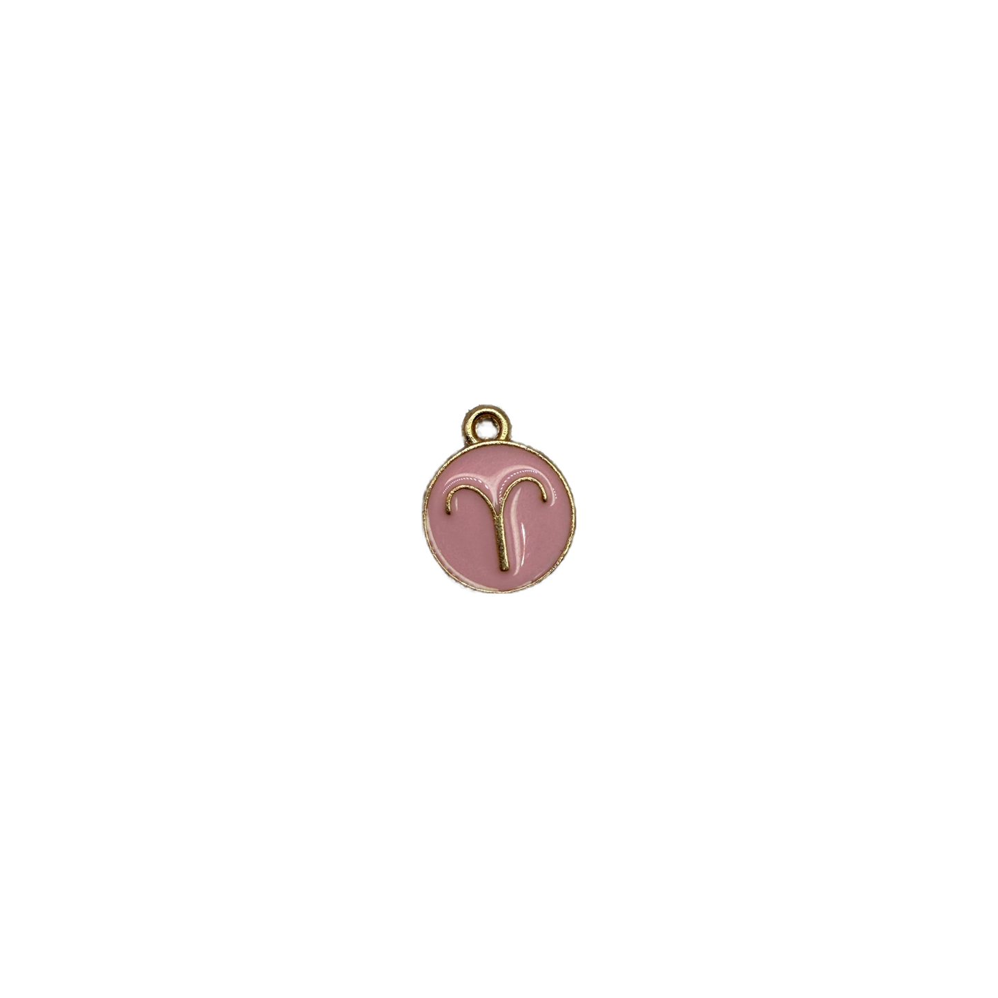 Blush pink Aries zodiac medallion with raised gold symbol