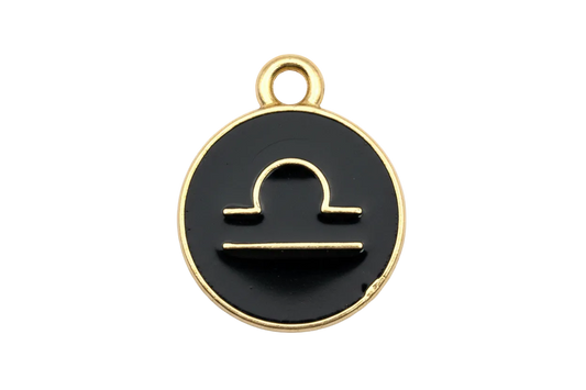 Black enamel round disc with gold Libra zodiac symbol and gold rim