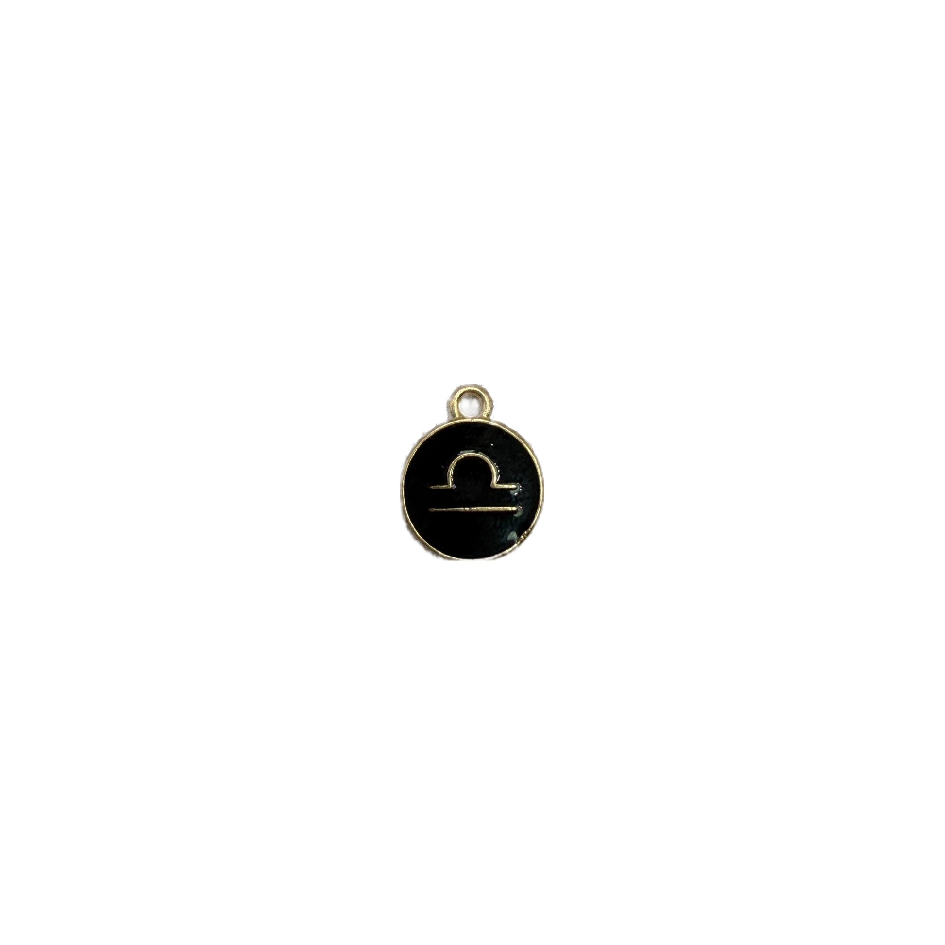 Black disc with gold Libra zodiac symbol