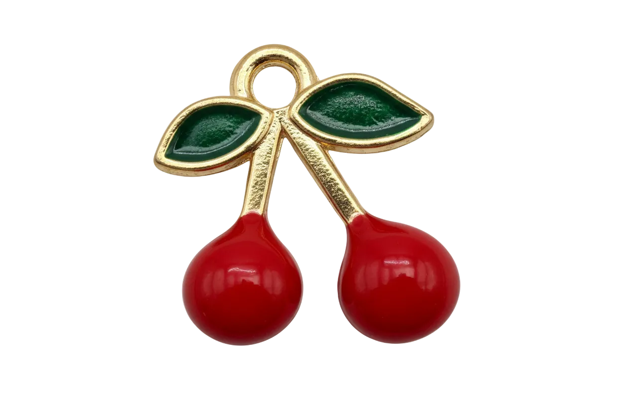 Gold cherry pair with glossy red enamel fruit and deep green leaves