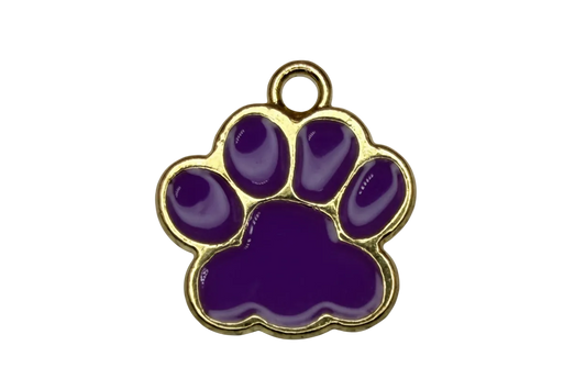 Glossy purple paw print charm outlined in gold with a small clear round gem accent