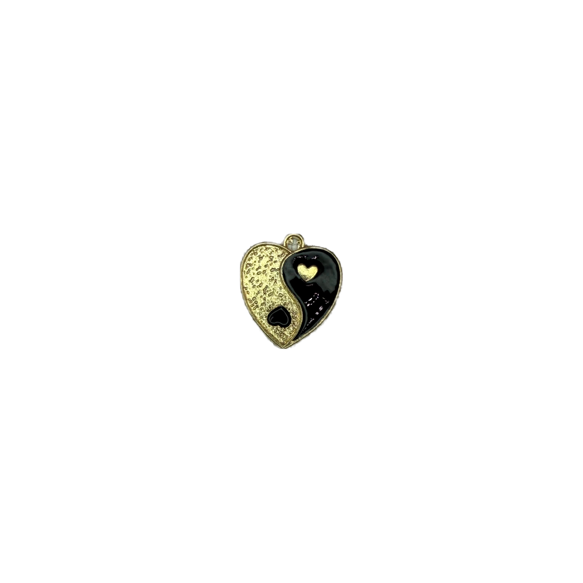 Two-tone yin-yang heart in gold and black enamel with tiny hearts