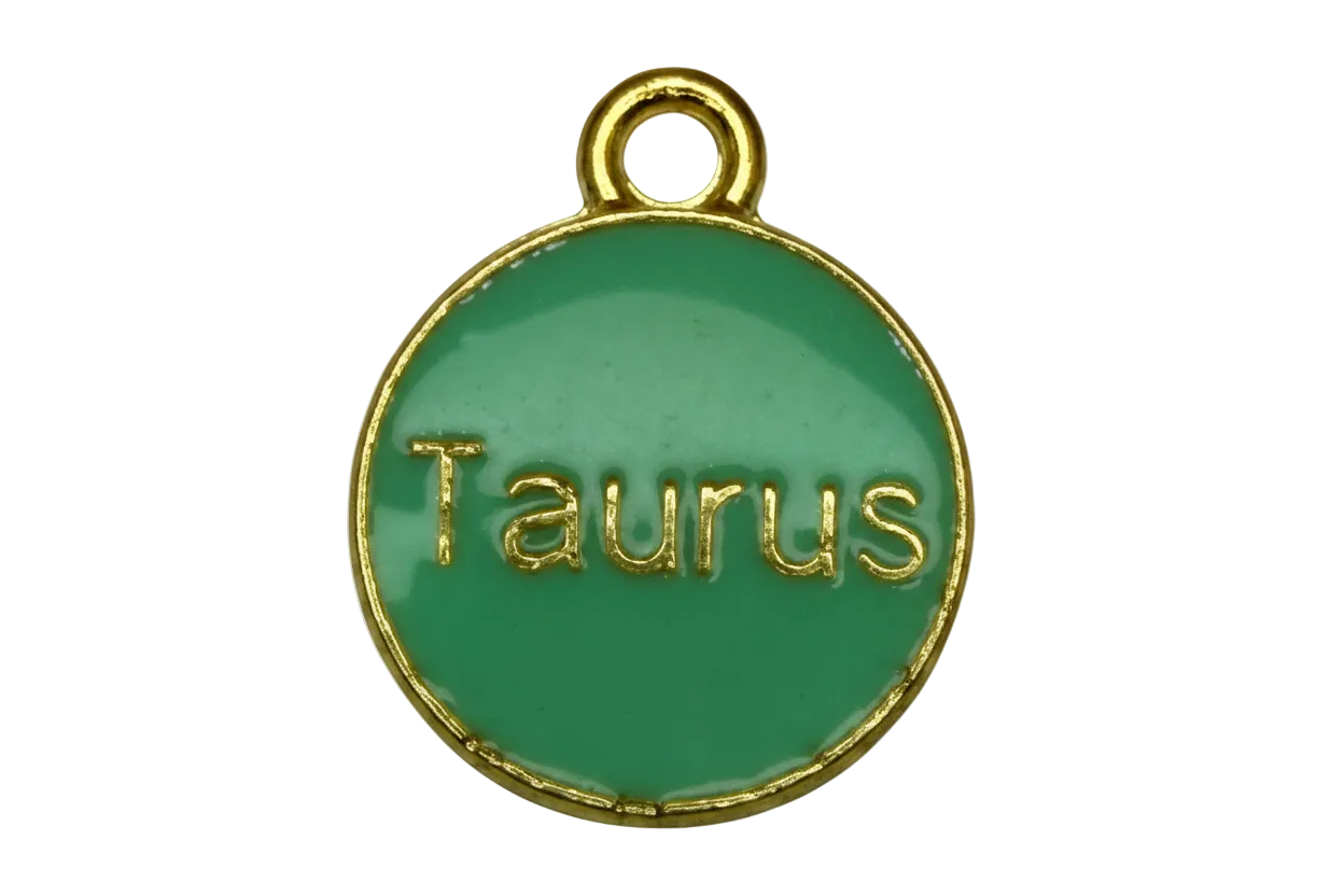 Green round Taurus medallion with raised gold lettering and gold trim