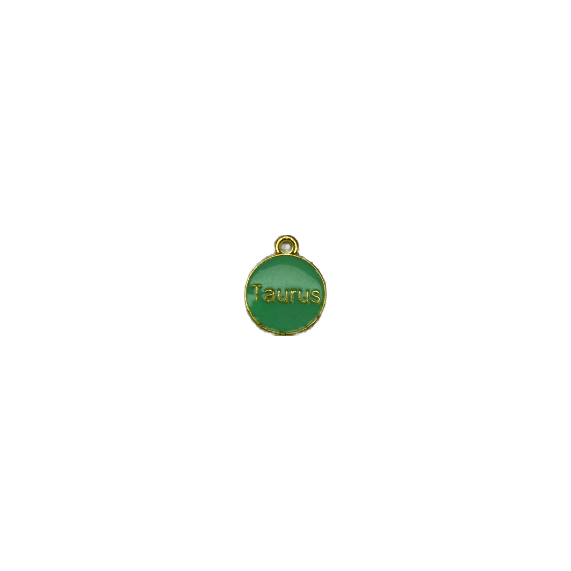 Green Taurus round medallion with raised gold lettering