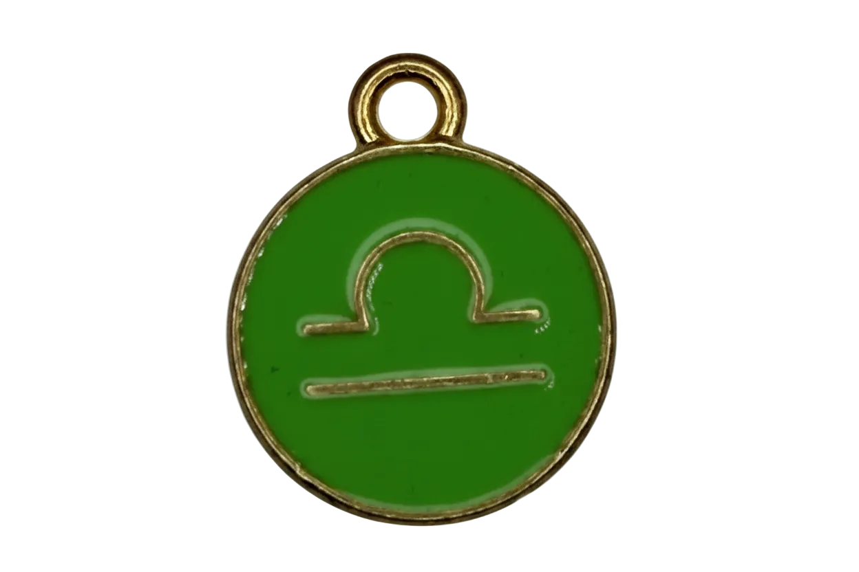 Green enamel Libra zodiac disc with gold outline and small clear crystal accent