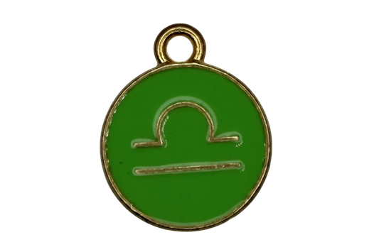 Green enamel Libra zodiac disc with gold outline and small clear crystal accent