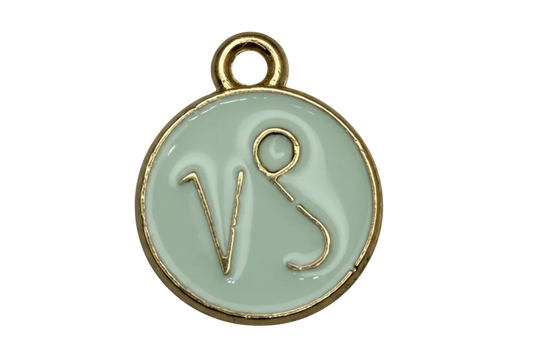 Glossy white enamel round disc with raised gold VS script and gold rim