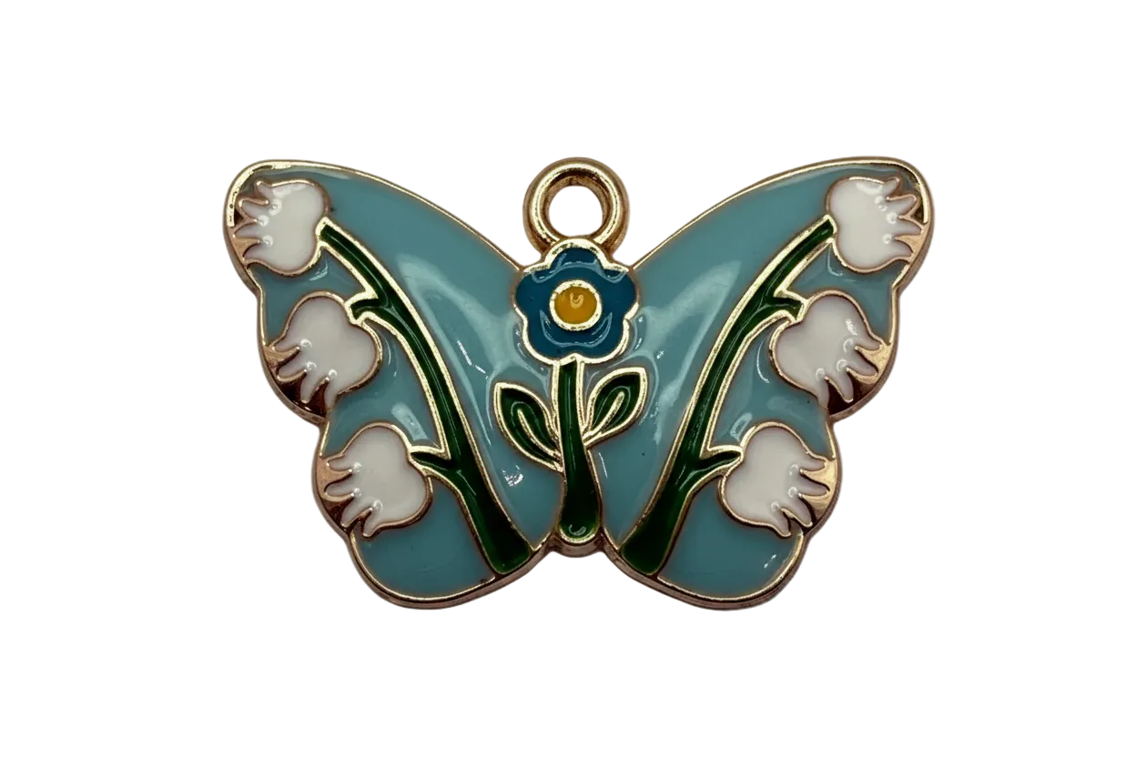 Sky-blue enamel butterfly with white flowers, green stems, and gold outline