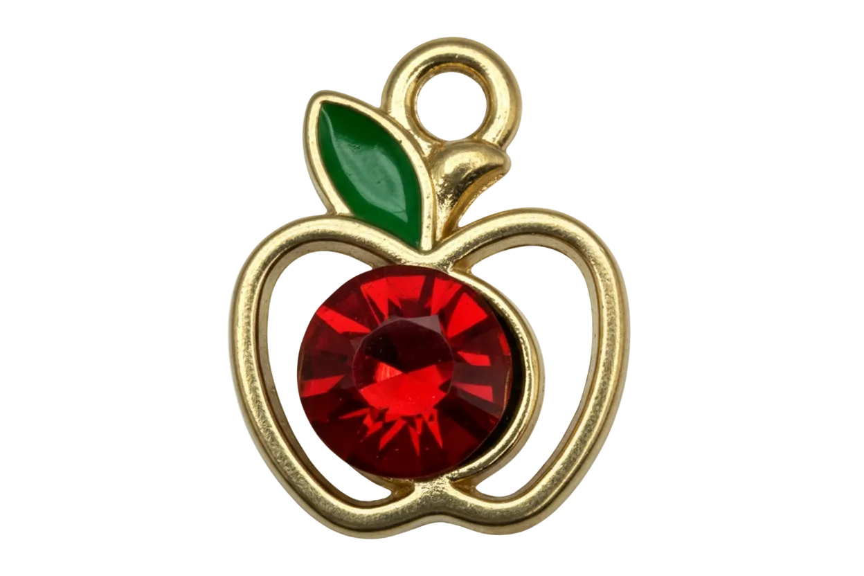 Gold apple outline charm with red faceted gem center and green enamel leaf