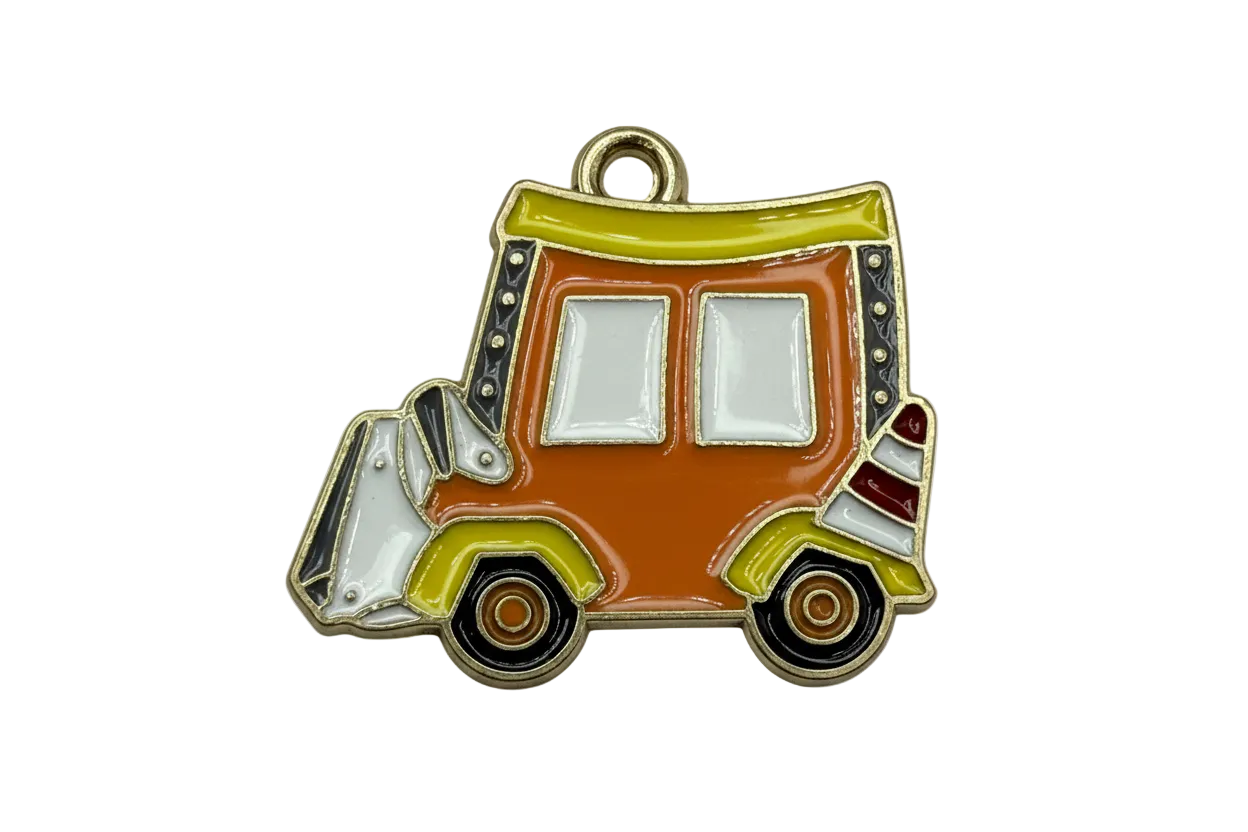 Glossy enamel retro food truck motif in orange with olive green trim, white windows, and black wheels on gold