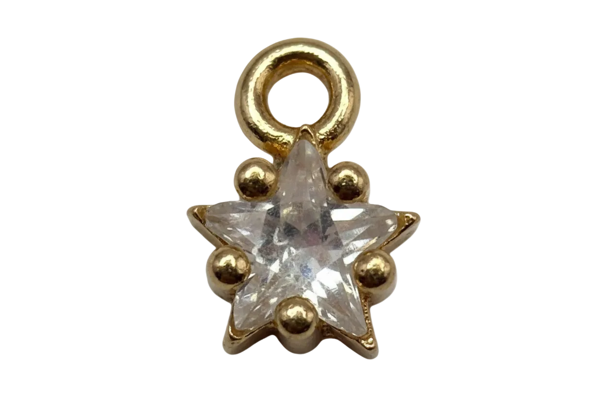 Gold starburst charm with faceted clear crystals and a clear center gem