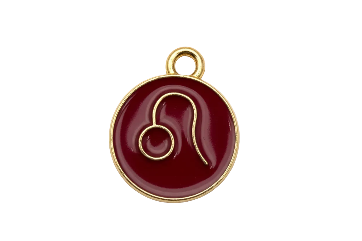 Burgundy enamel Leo zodiac medallion with gold outline and glyph