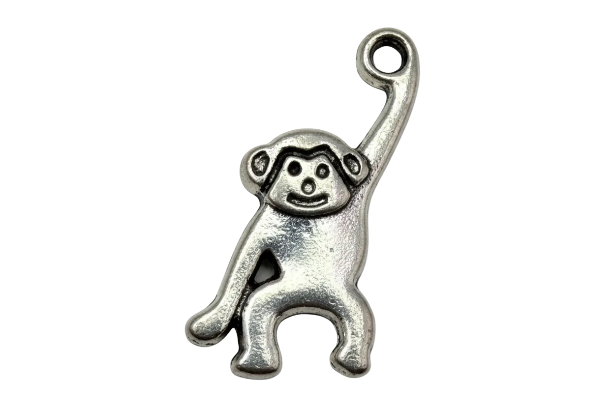 Oxidized silver-tone hanging monkey figure with raised arm and engraved face