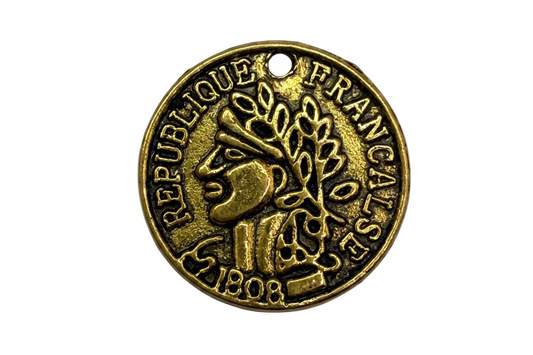 Antiqued gold coin medallion with raised emblem and French inscription, round disc design
