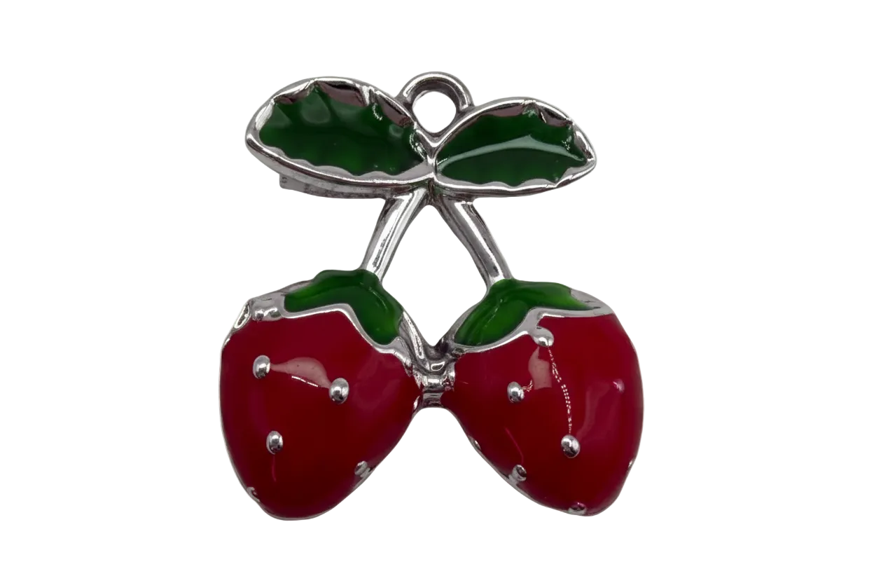 Glossy red cherry pair with green leaves in bright silver finish