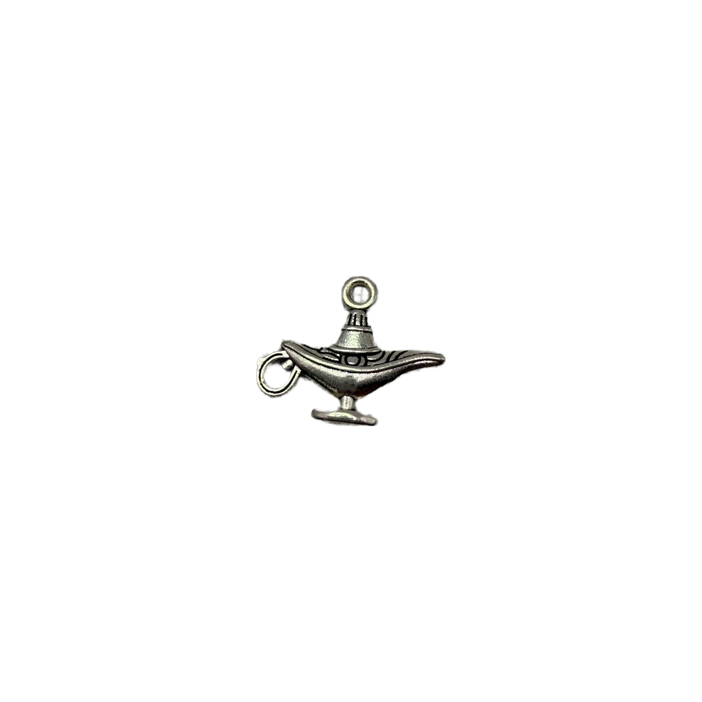 Antique silver magic lamp with engraved detailing