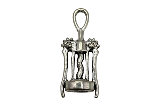 Antique-finish silver corkscrew charm with winged arms and twisted center