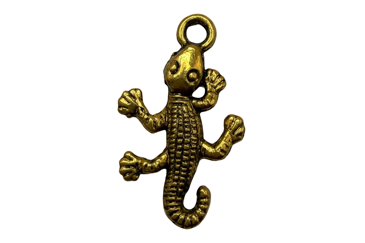 Antique gold gecko figure with textured body and curled tail