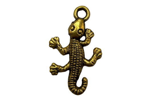 Antique gold gecko figure with textured body and curled tail