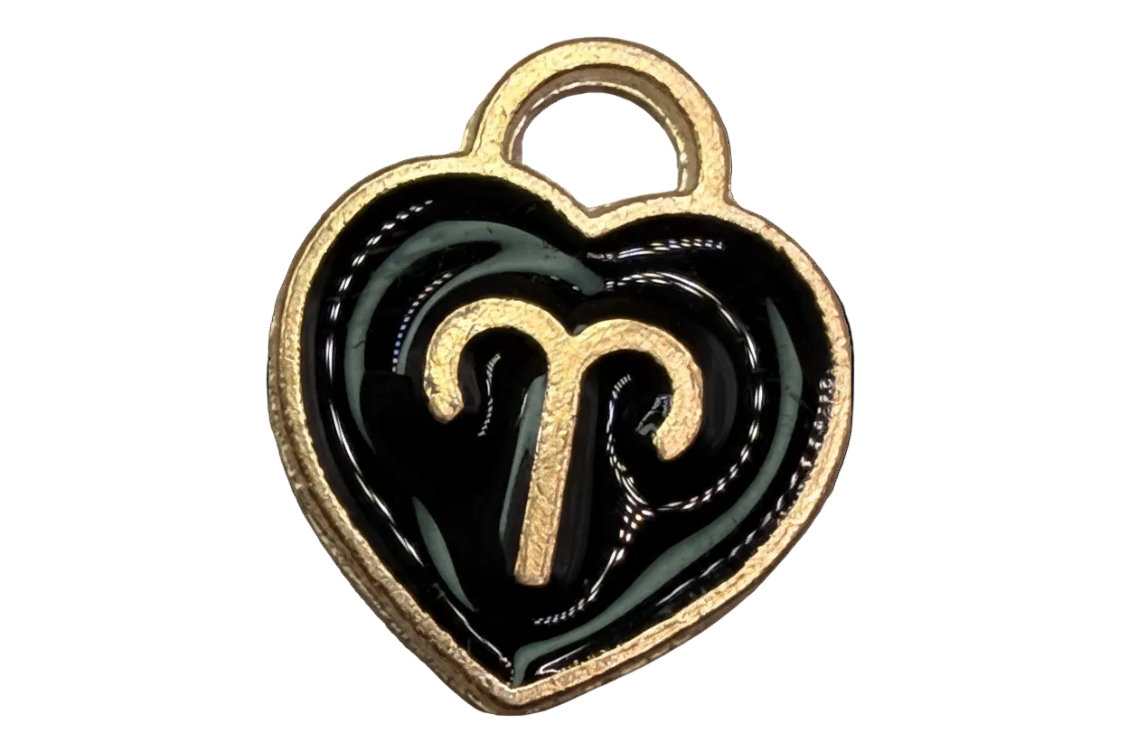 Glossy black heart with gold outline and Aries zodiac symbol