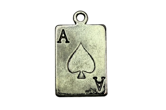 Antique silver ace of spades playing card tag with engraved spade symbol and letter A