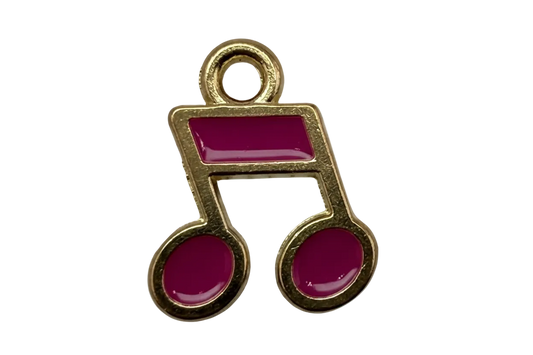 Gold musical note with glossy magenta enamel accents
