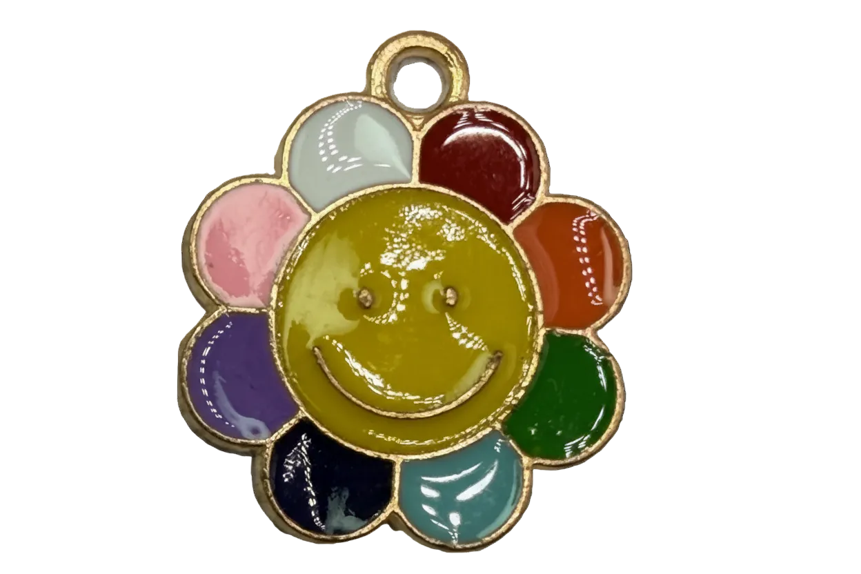 Rainbow enamel flower with yellow smiley face center and gold outline