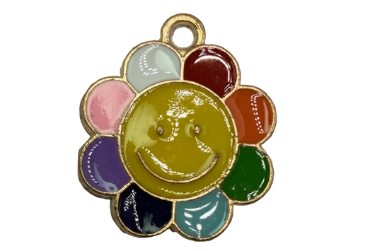 Rainbow enamel flower with yellow smiley face center and gold outline