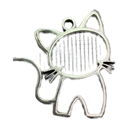 Antiqued silver cat outline silhouette with tail and whisker details