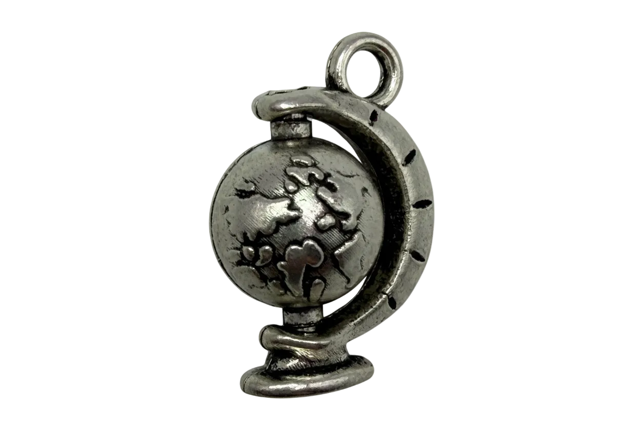Antiqued silver-tone world globe charm with engraved continents and darkened detailing