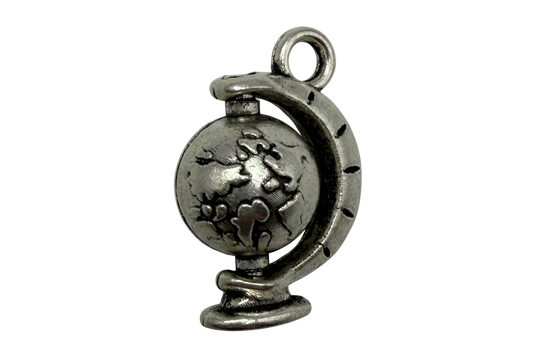 Antiqued silver-tone world globe charm with engraved continents and darkened detailing
