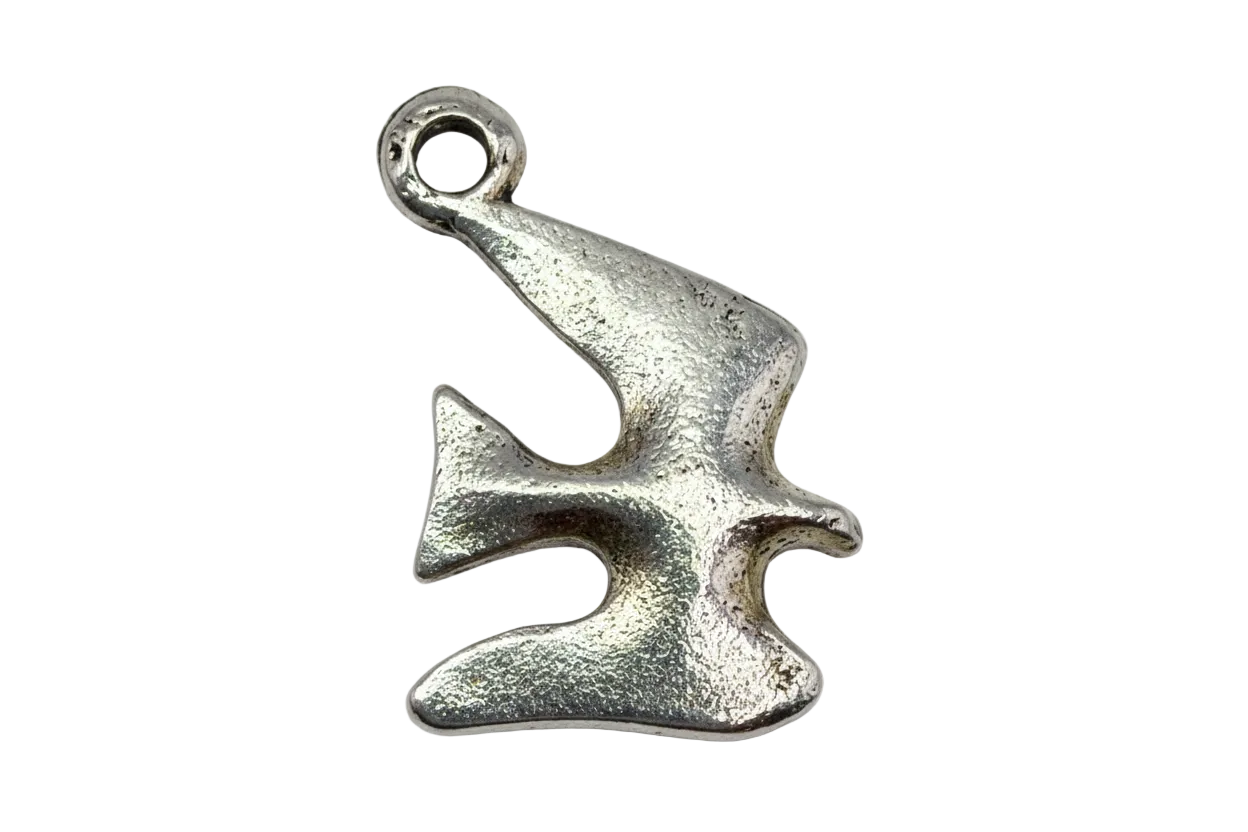 Textured silver jigsaw puzzle piece with a softly worn finish