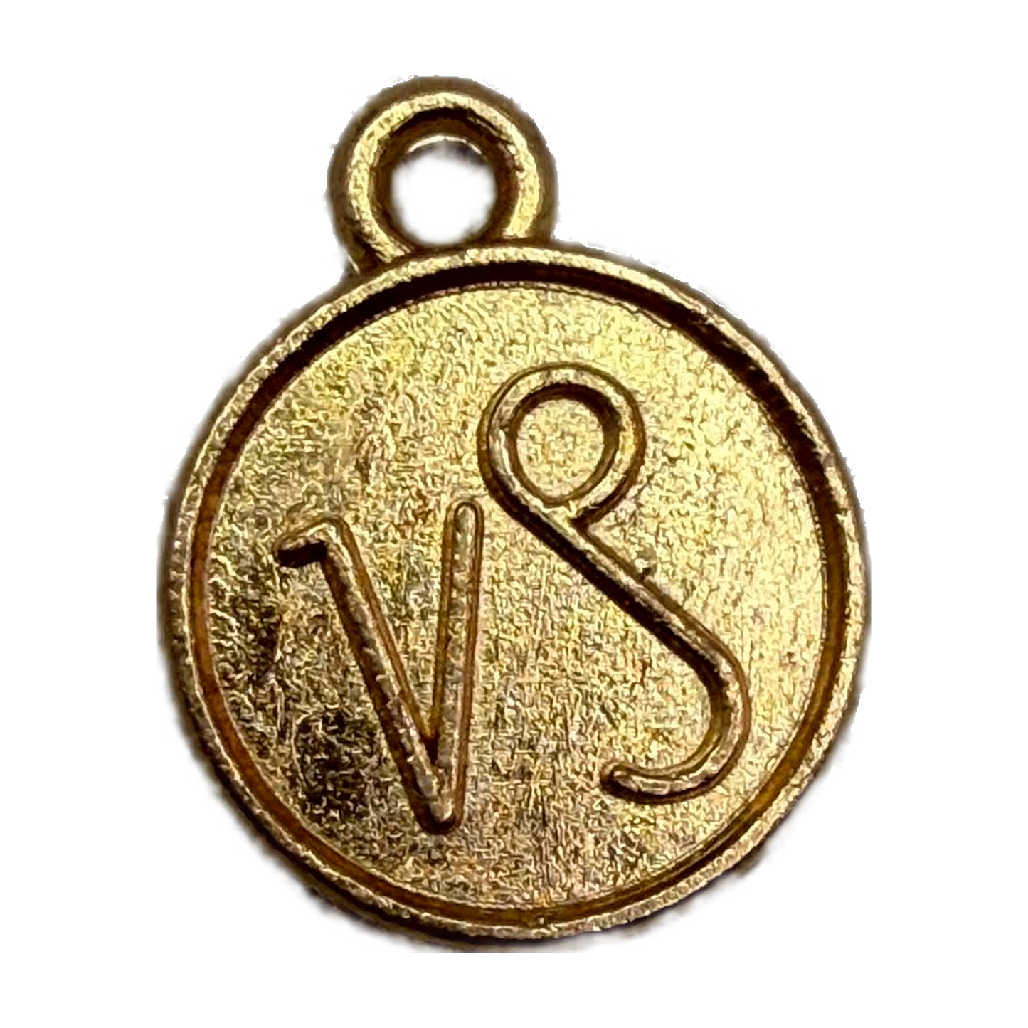 Round gold medallion with raised VS monogram and textured finish