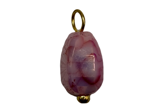 Faceted rose pink oval gem with translucent lilac tones and gold details