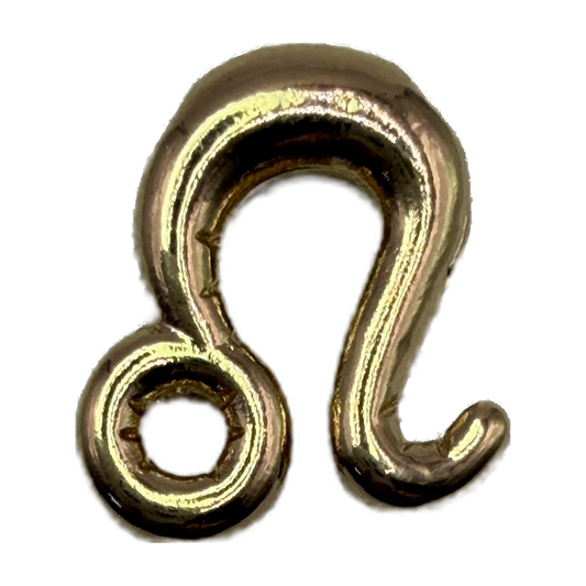 Polished gold Leo zodiac symbol with rounded sculptural contours