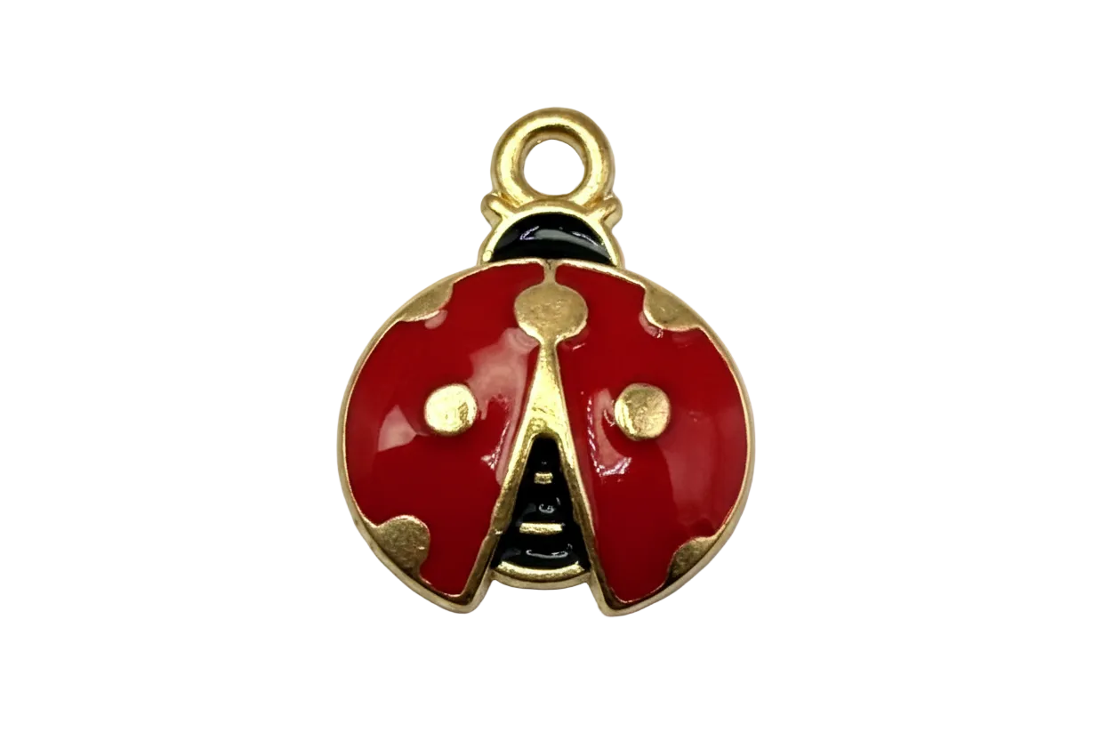 Glossy red ladybug charm with gold detailing, black accents, and a small clear gem