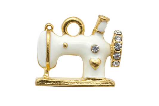 White and gold sewing machine charm with clear crystals and small heart detail