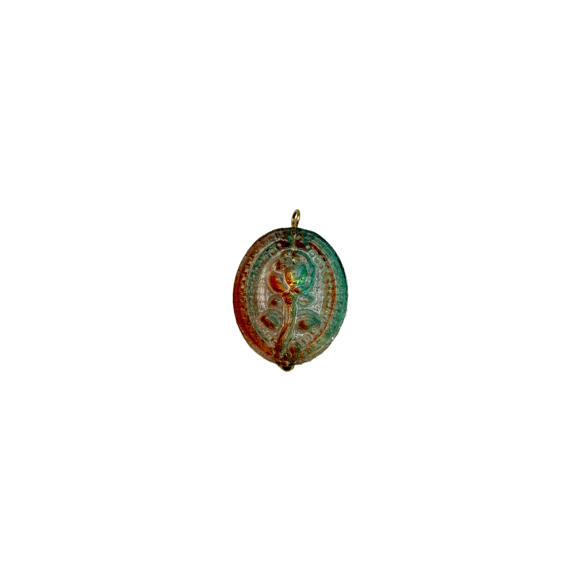 Oval floral medallion charm with verdigris patina and amber tones