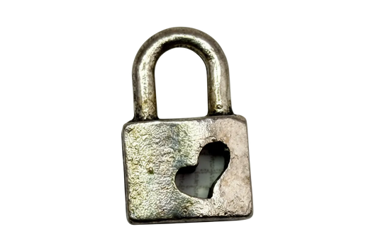 Antique silver padlock charm with heart-shaped keyhole cutout and warm-toned top detail
