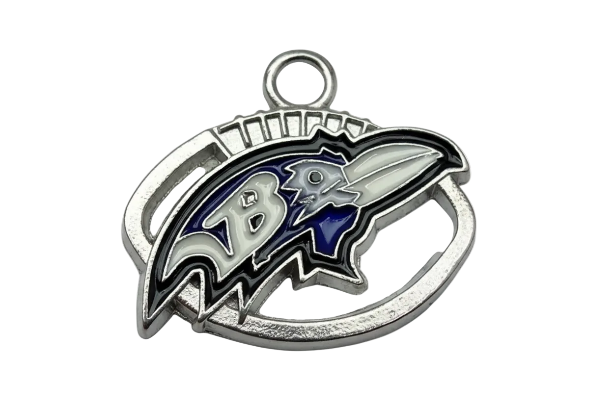 Silver enamel raven head emblem with navy and white accents and an initial detail