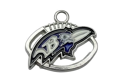 Silver enamel raven head emblem with navy and white accents and an initial detail