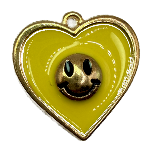 Glossy yellow enamel heart with gold smiley face and gold border