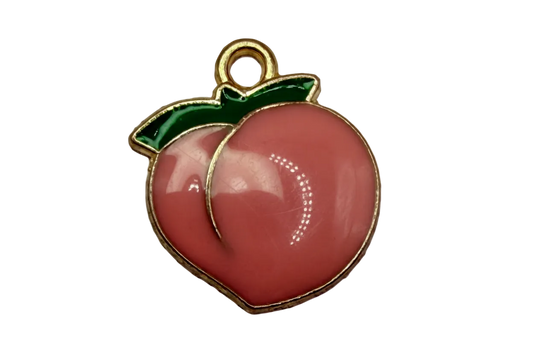 Glossy pink peach with green leaves and gold outline