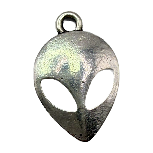 Textured silver alien head face charm with cutout eyes