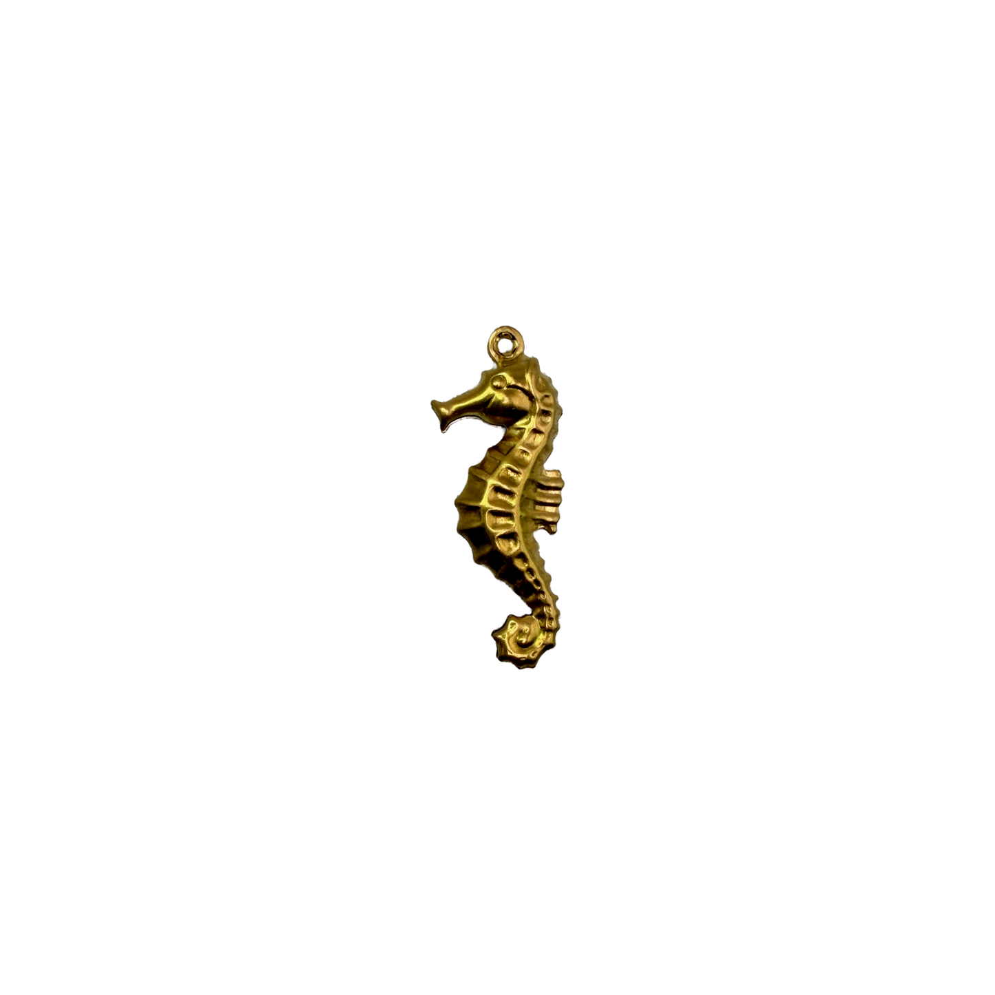 Gold sculpted seahorse with ridged texture